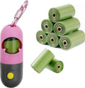 Poop bag dispenser with flashlight.